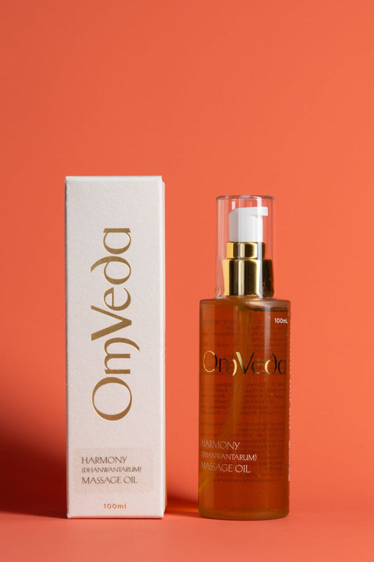 Massage oil with pump bottle and carton, amber liquid, OmVeda Harmony Professional