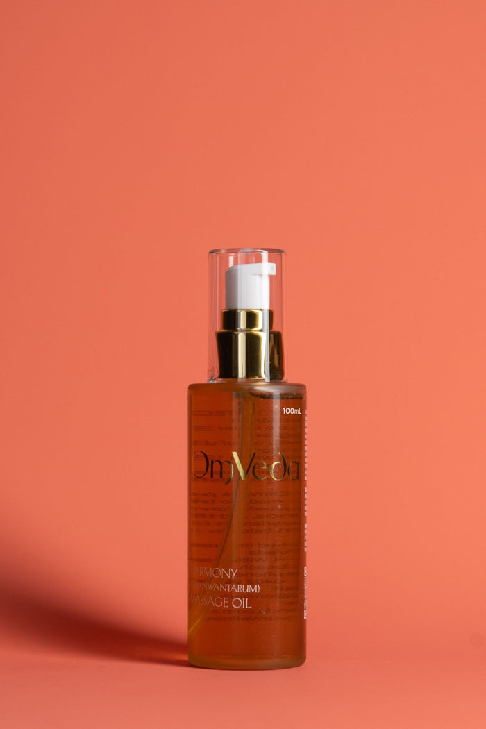 OmVeda Harmony professional massage oil pump bottle, amber liquid