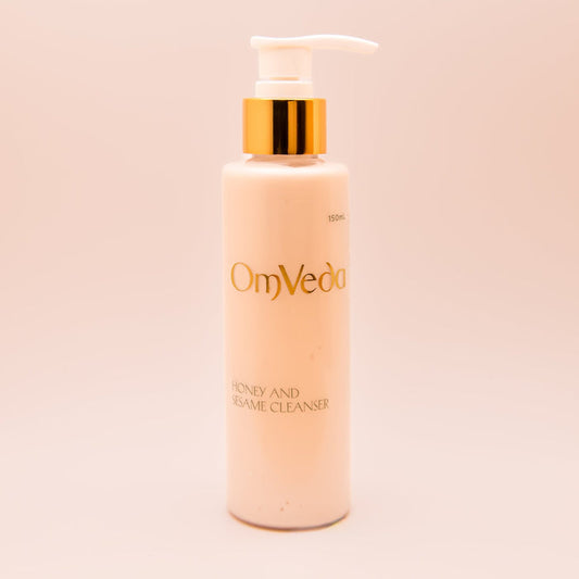 OmVeda Honey and Sesame Cleanser 150ml pump bottle with gold dispenser