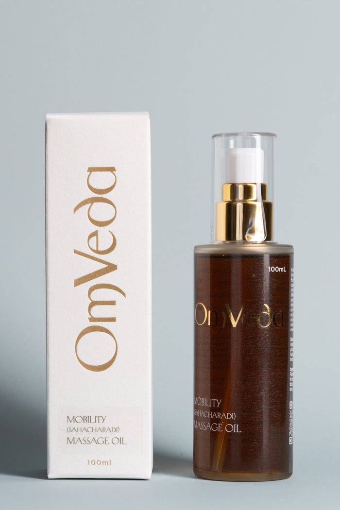 OmVeda mobility massage oil 100 ml bottle with gold pump and box