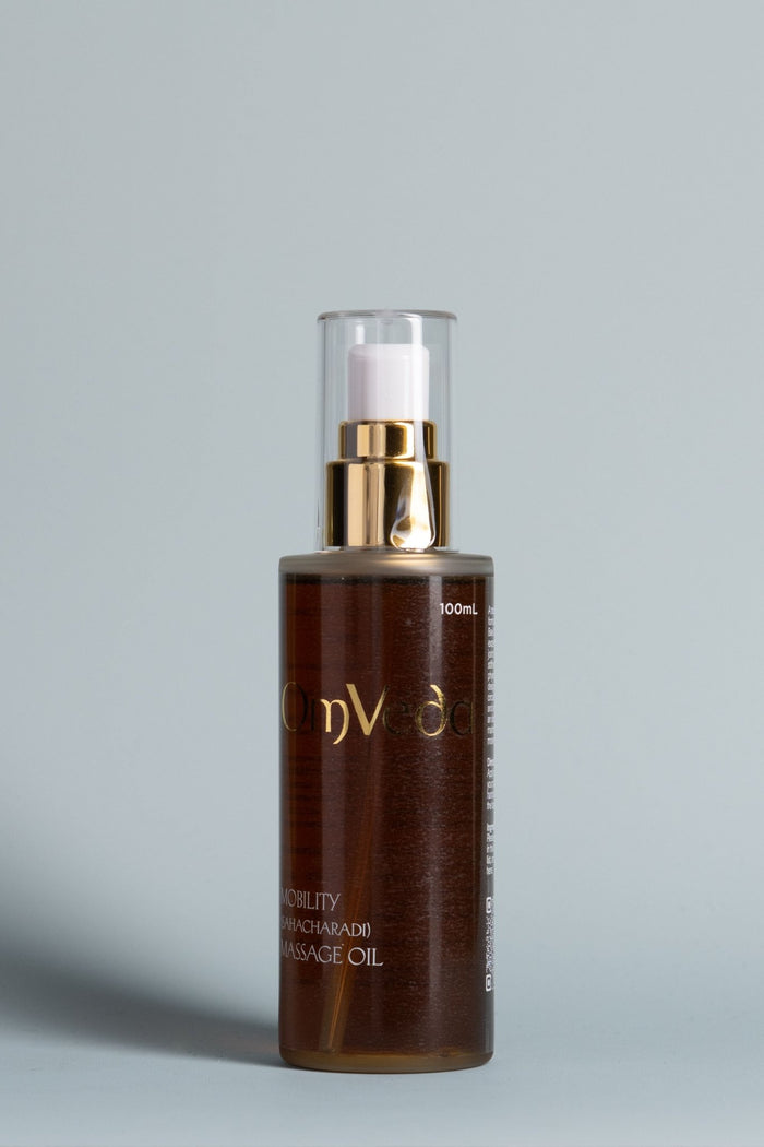 OmVeda mobility massage oil 100 ml bottle with gold pump