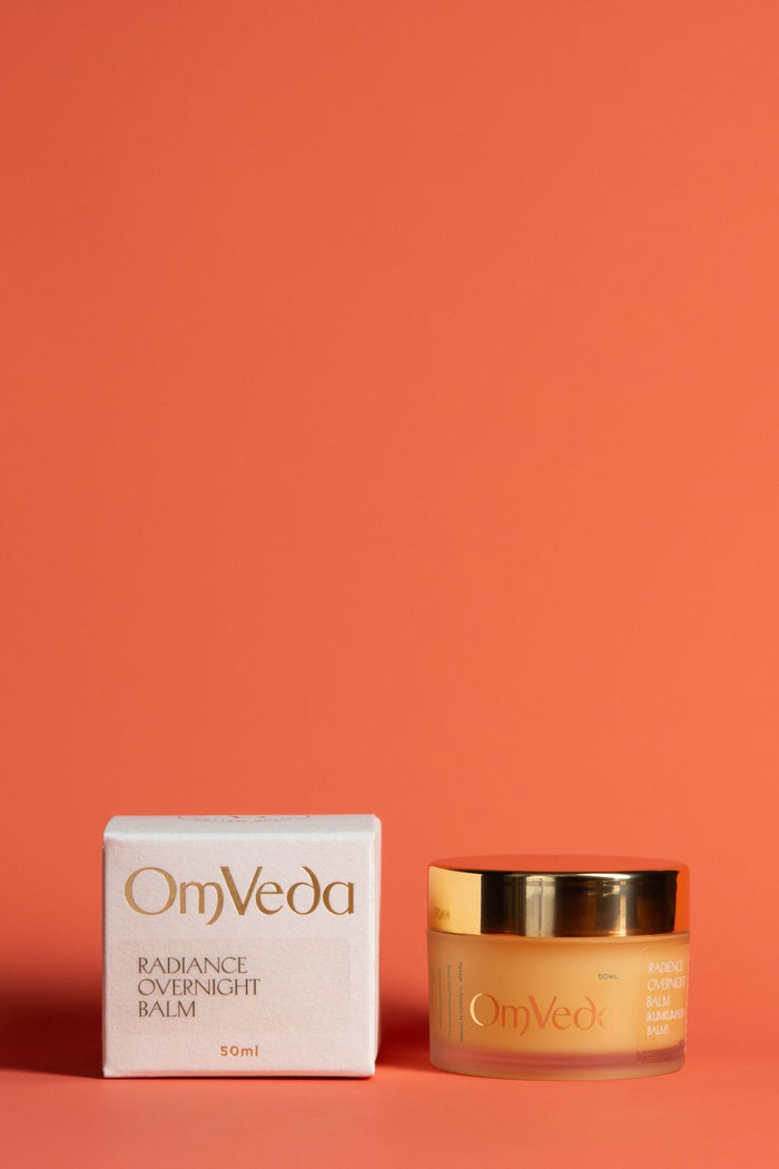 OmVeda Radiance Kumkumadi balm jar with matching box