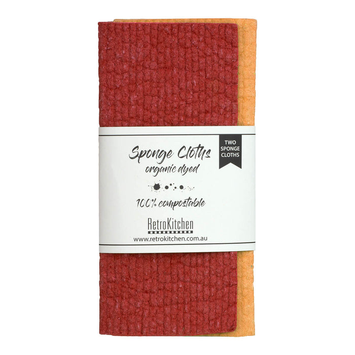 RetroKitchen Organic Dyed Compostable Sponge Cloth Set, a set of 2 super absorbent, machine washable and compostable dish cloths made from cotton and cellulose. Comes with a dark red and orange cloth. Packaged with a paper tag.