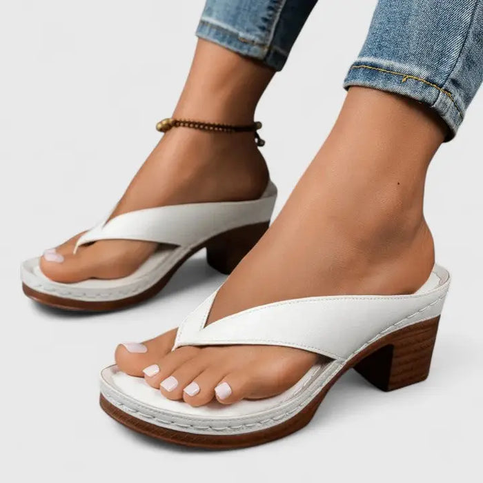 Elegant black orthopedic women's closed-toe block heels with a classic pump design, offering comfort and support.