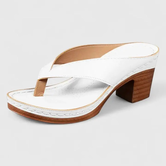 Elegant orthopedic women's closed-toe heels with a block heel and classic pump design, offering stylish comfort.