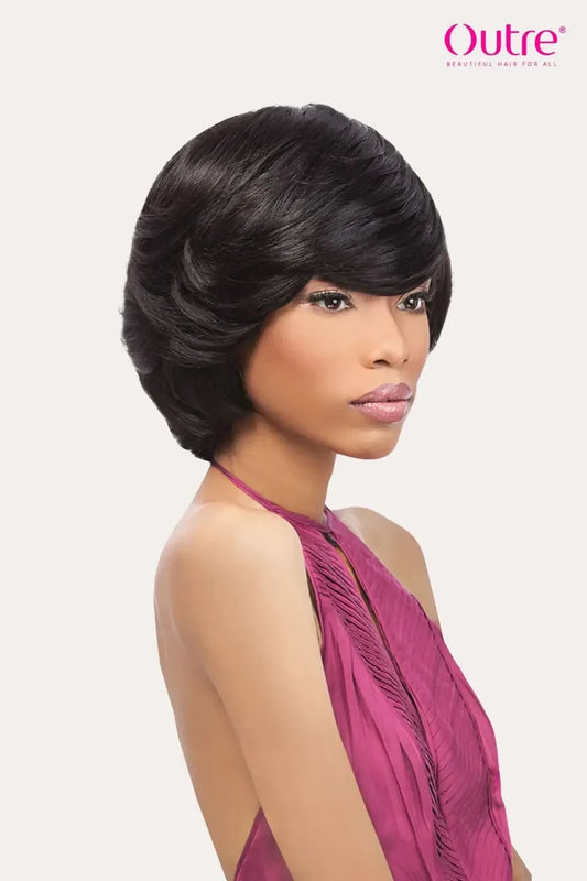 Model wearing Outre Velvet Remi Tara 4-6-8 human hair weave styled in a voluminous mushroom cut and sleek short bob
