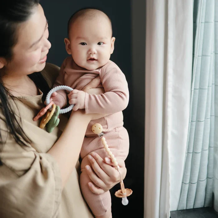Mushie - Pacifier Clip - Hera - Pale Yellow - Lifestyle Cut 1