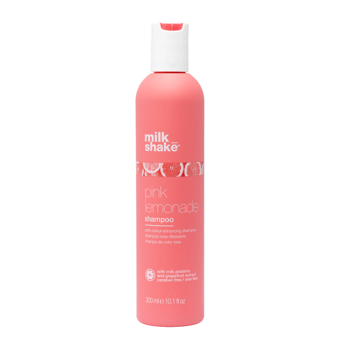 Pink shampoo bottle labeled 'milk_shake pink lemonade' on a white background