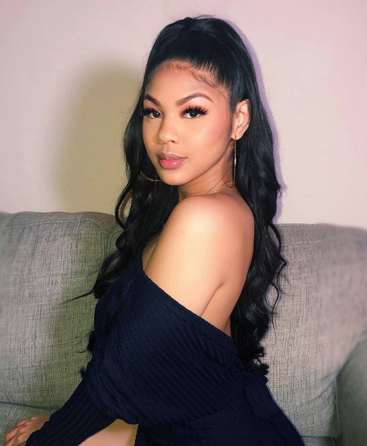 model wearing clip in ponytail jet black