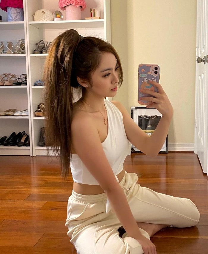 model wearing ponytail hair extension