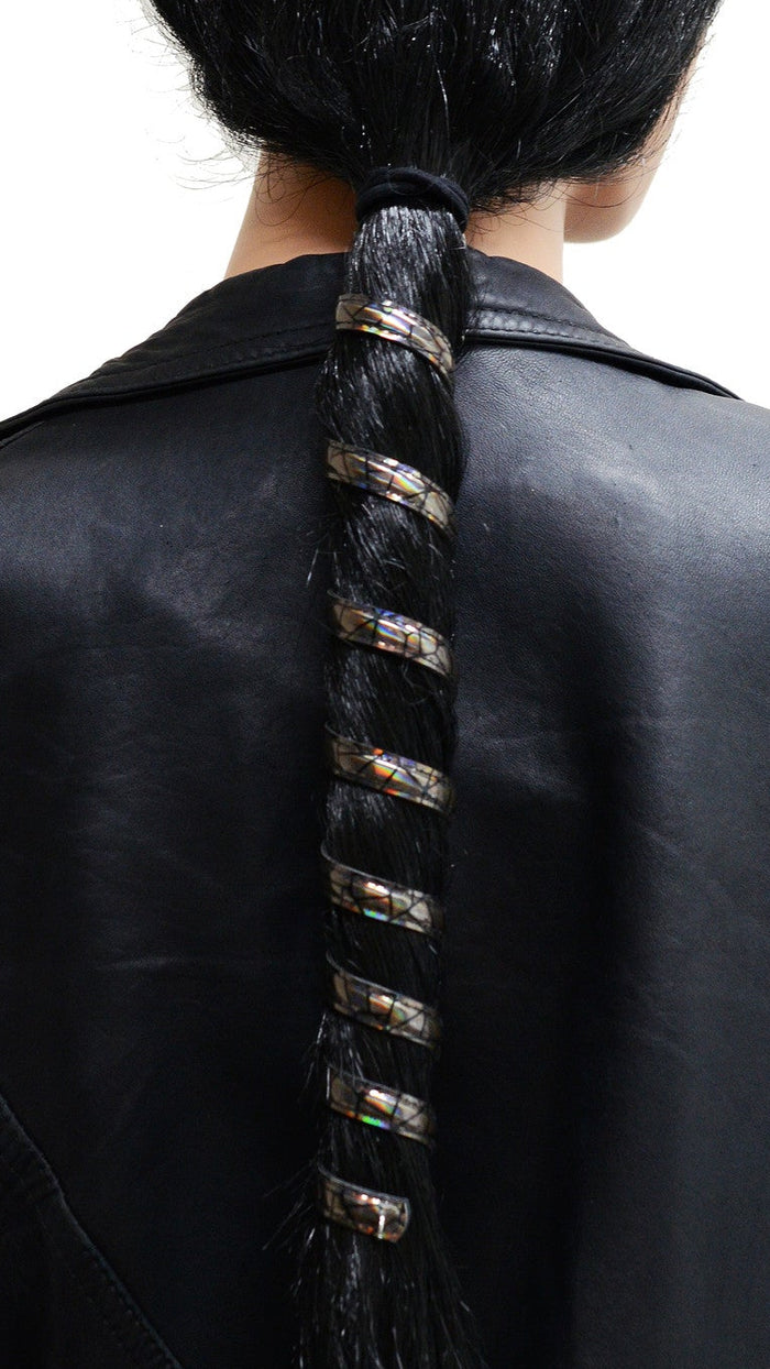 12 inch holographic black anodized aluminum ponytail wrap, spiral design, front view on white background