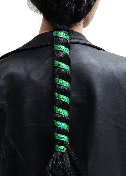 Model wearing 12 inch holographic green anodized aluminum ponytail wrap, spiral design, back view in ponytail