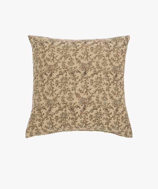 A square beige pillow features an intricate floral pattern in shades of brown and gray, conveying an elegant and vintage aesthetic. | Wildwood Home Co.