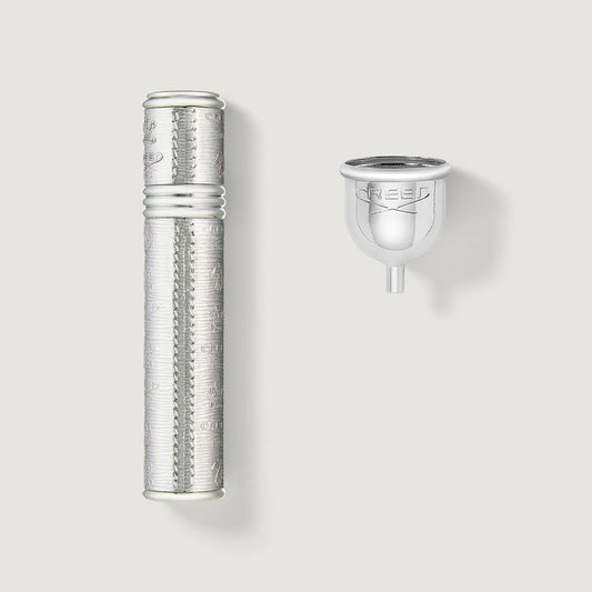 Silver 10ml Refillable Travel Perfume Atomizer with Engraved Creed Crest & Filling Funnel - Flat Lay | Creed Boutique