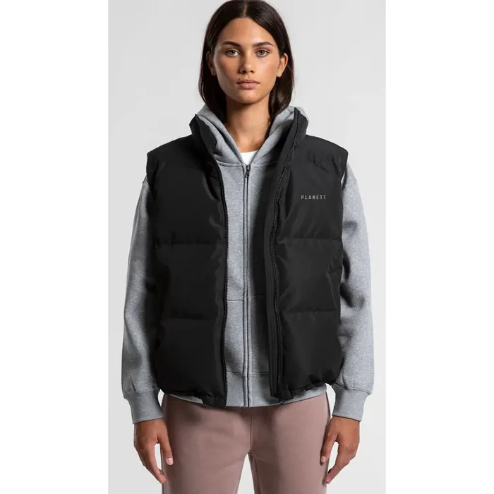 Black sarah puffer vest with hood and front zipper worn over gray hoodie ideal for workwear and uniforms