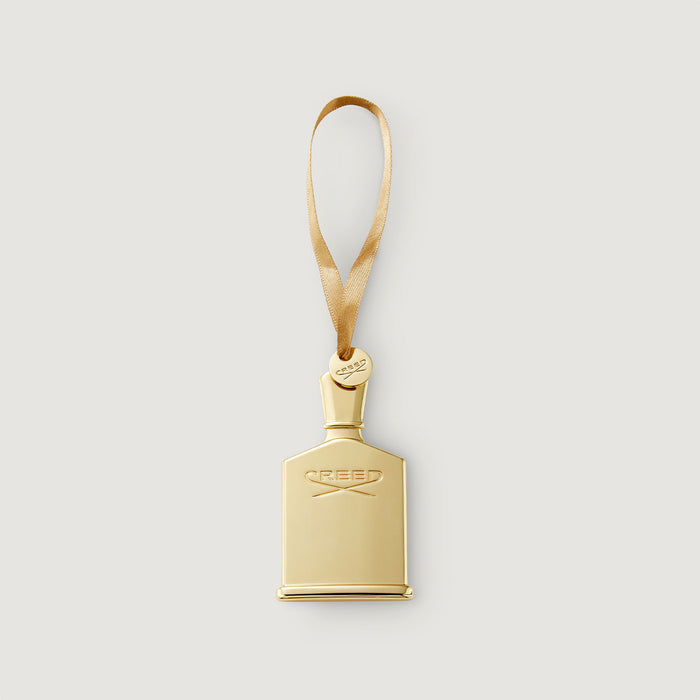 Gold Metal Birmanie Oud Scented Ornament - Front View with Satin Ribbon | Creed Boutique