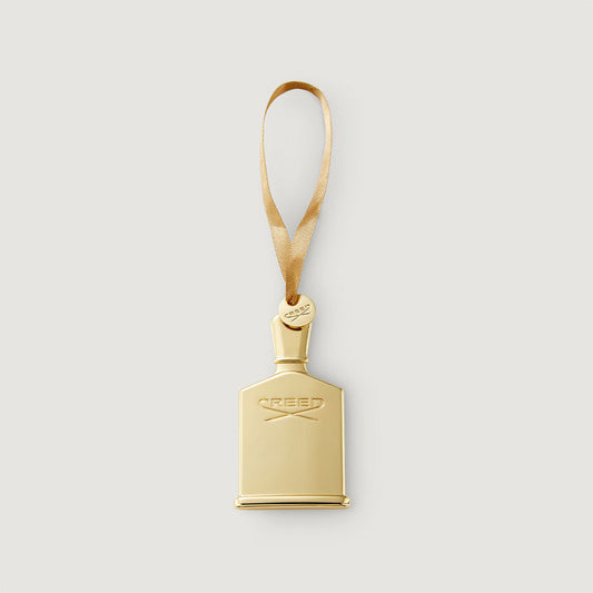 Gold Metal Birmanie Oud Scented Ornament - Front View with Satin Ribbon | Creed Boutique