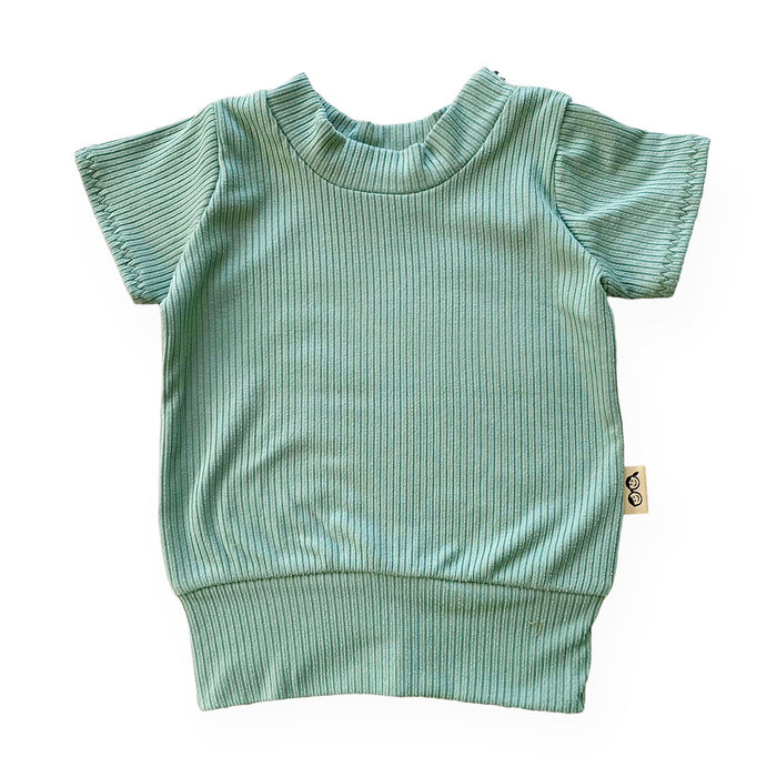 Flat-lay of the short-sleeve ribbed top from the Sea Spray Ribbed Summer Lounge Set in a beautiful green color, perfect for warm weather.