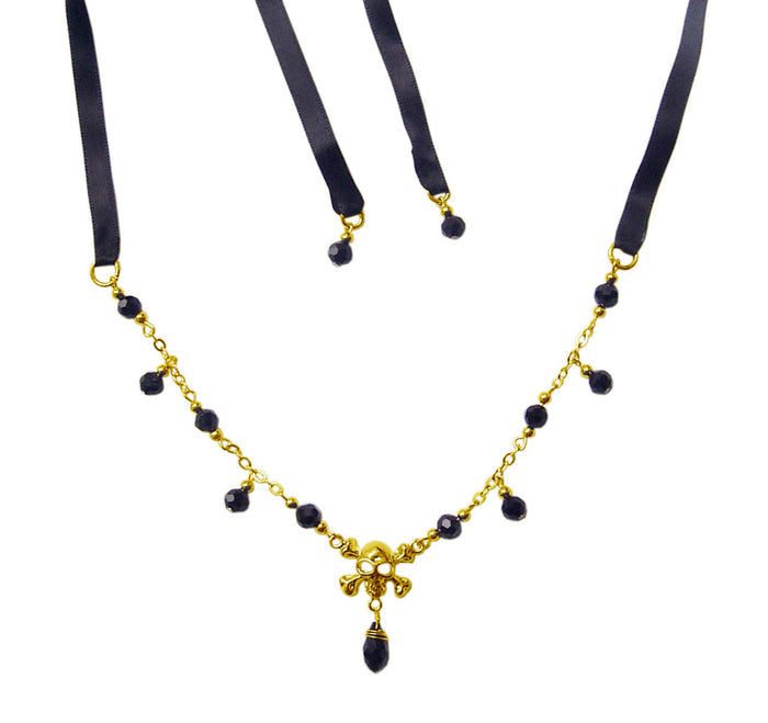 gold skull and crossbones crown necklace with black beads tie on ribbon gothic jewelry front view