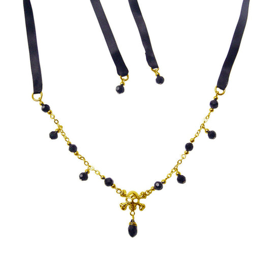 gold skull and crossbones crown necklace with black beads tie on ribbon gothic jewelry front view