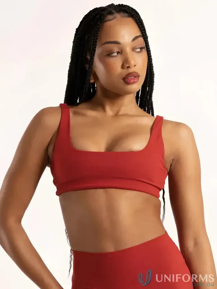 Red cropped sports bra with square neckline and thin straps perfect for comfortable work uniforms or active workwear