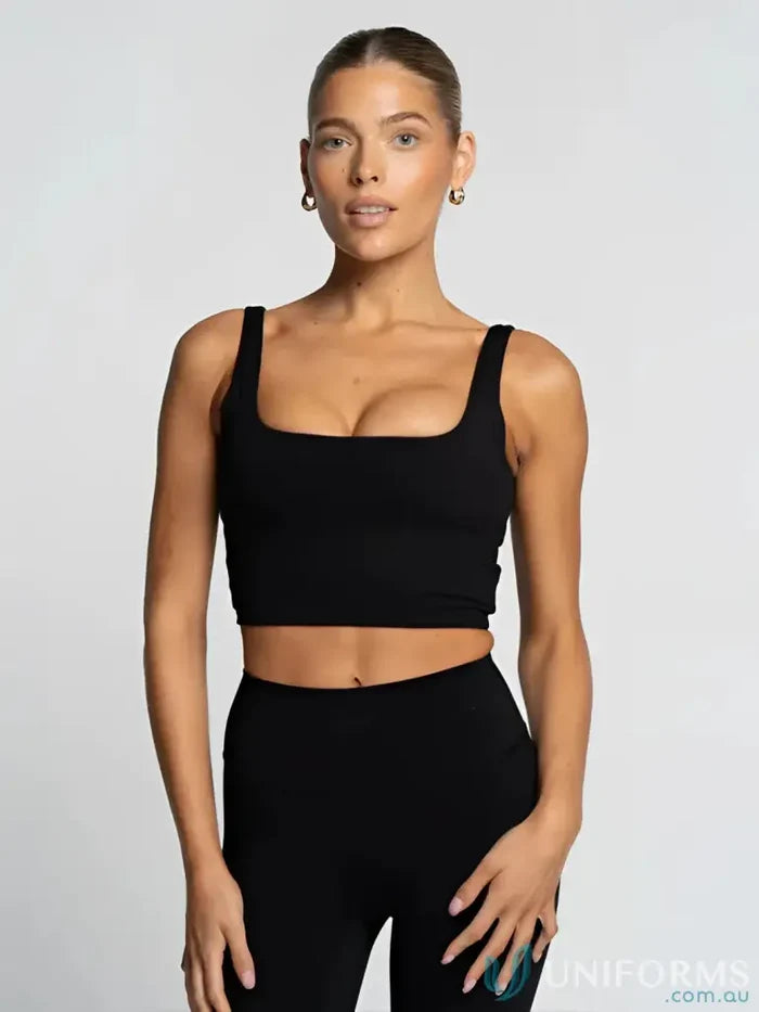 Black square neck crop top with thin straps in smooth fabric perfect for stylish work uniforms and workwear looks