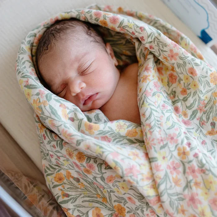 Mushie - Swaddle - Organic Cotton - Pastel Blooms - Lifestyle Cut 1