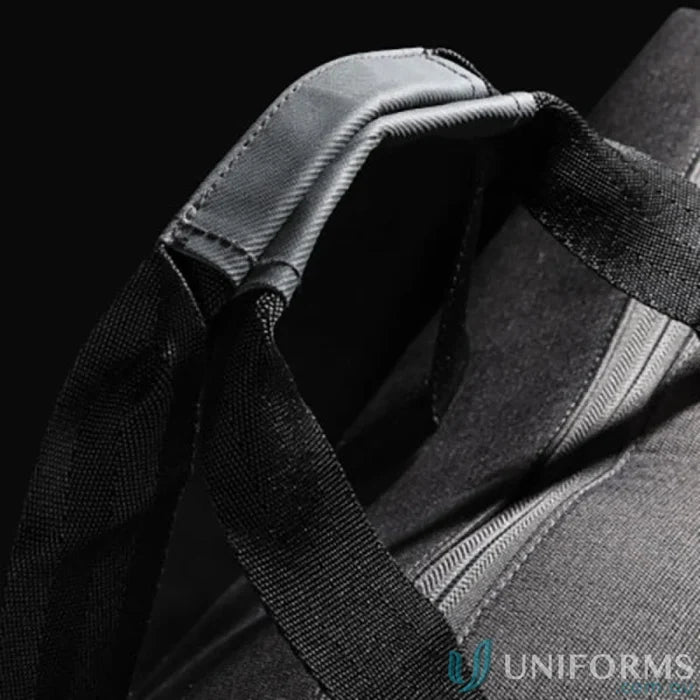 Black bag handle of Swissdigital Arosa Duffle Bag for work uniforms and workwear