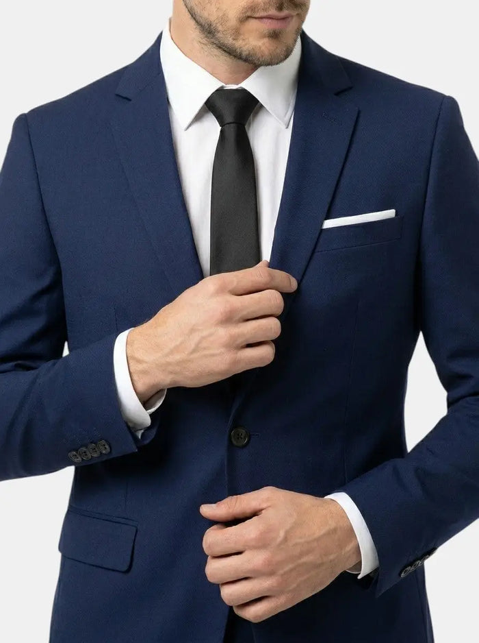 Tim Elegant men's suit set featuring a tailored blazer and matching tie, perfect for formal occasions.