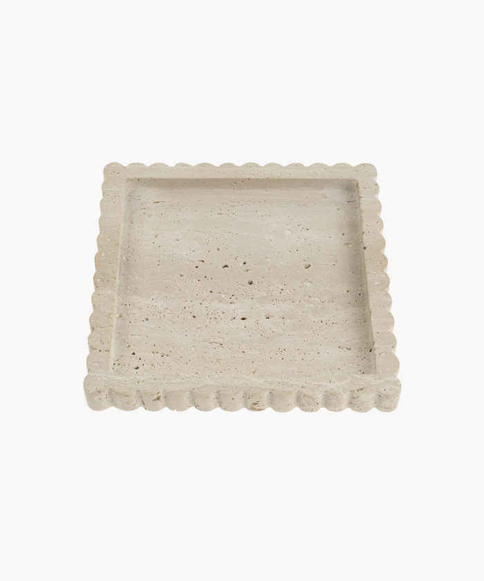 Square beige stone tray with a scalloped edge. The surface is textured with natural imperfections, conveying a rustic, elegant tone. | SW Home