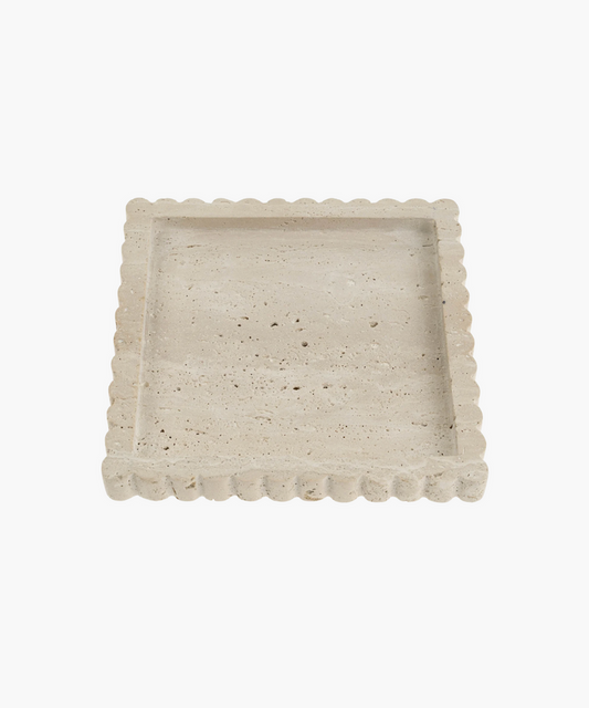 Square beige stone tray with a scalloped edge. The surface is textured with natural imperfections, conveying a rustic, elegant tone. | SW Home