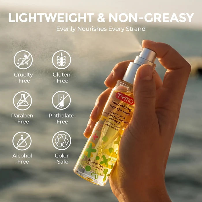 TYMO Nourishing Hair Oil Mist spray in hand seaside scene, lightweight non-greasy argan oil hair mist, cruelty free alcohol free hair care serum, hydrating hair treatment spray