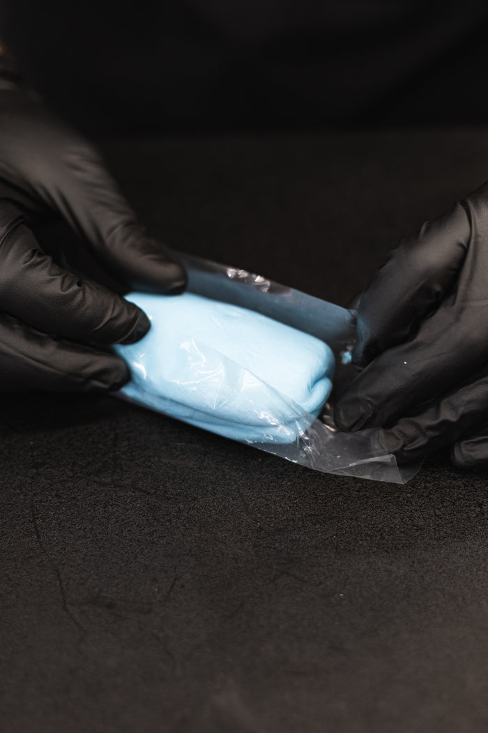 The Rag Company Ultra Clay Bar being taken out of it's packaging.
