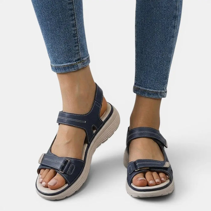 Women's adjustable synthetic orthopedic sandals with cushioned footbed and supportive straps, ideal for comfortable summer wear.