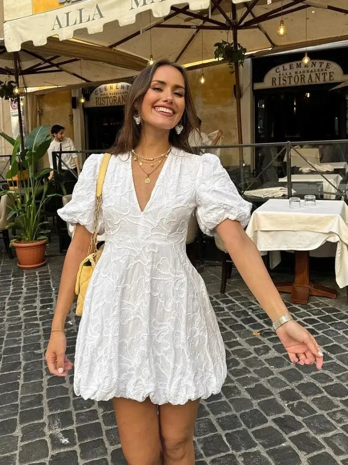 Women's airy fabric summer dress by LondonLaneStore featuring an elegant white design with embroidered ruffles.