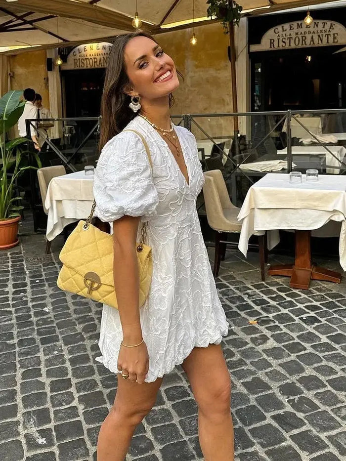 Women's airy fabric summer dress by LondonLaneStore, elegant white dress with embroidered ruffles and flowy design.