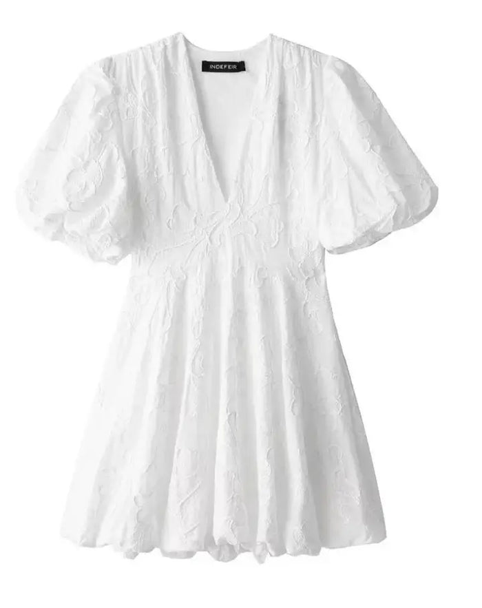 Women's airy fabric summer dress by LondonLaneStore, elegant white dress with embroidered ruffles and lightweight design.