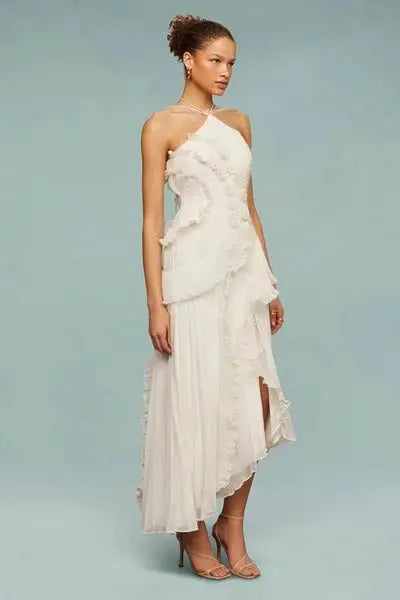 Women's artistic patchwork maxi dress with flowing ruffle details, perfect for summer, by LondonLaneStore.