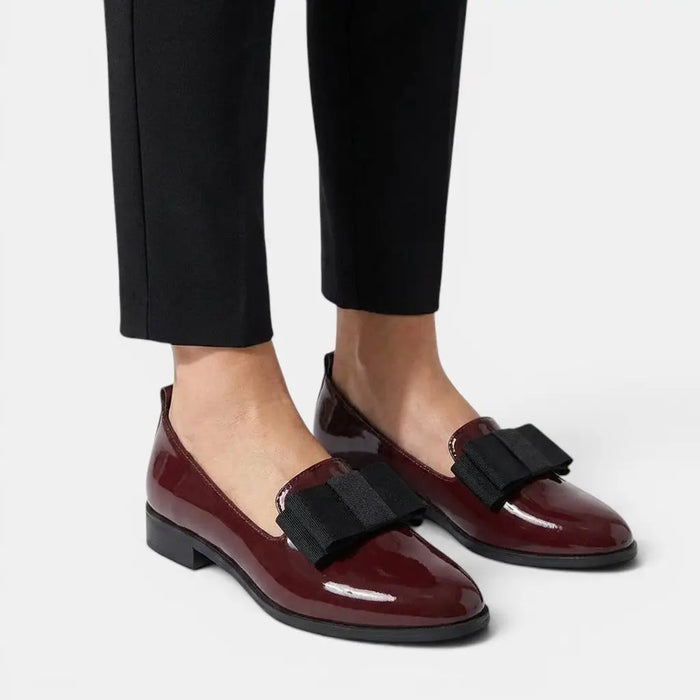 Women's black patent leather loafers with pointed toe slip-on design, stylish and elegant women’s loafers from LondonLaneStore.