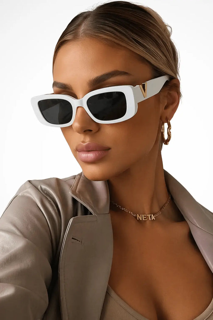 Women's bold cat eye sunglasses with chic chunky frames, stylish summer accessory by LondonLaneStore.