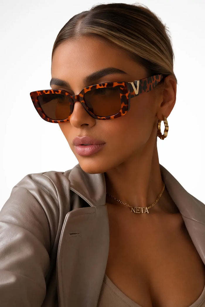 Chic women's bold cat eye sunglasses with chunky frame from LondonLaneStore, stylish summer accessory for a fashionable look.