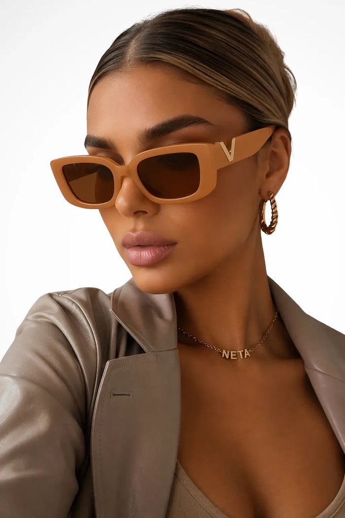 Women's bold cat eye sunglasses with chunky frame design, stylish summer accessory from LondonLaneStore.