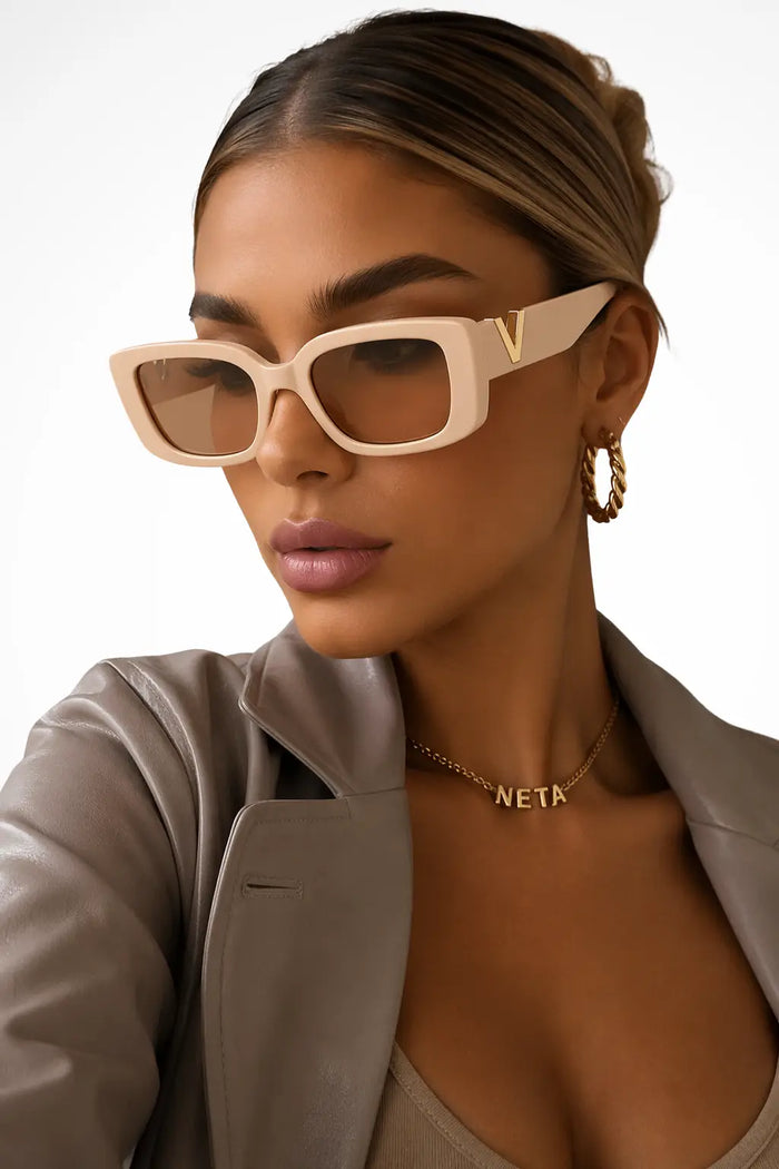 Women's bold cat eye sunglasses with chic chunky frame design, stylish summer accessory by LondonLaneStore.