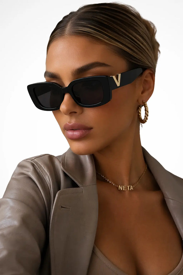Women's bold cat eye sunglasses with chunky frame design, stylish summer accessory from LondonLaneStore.