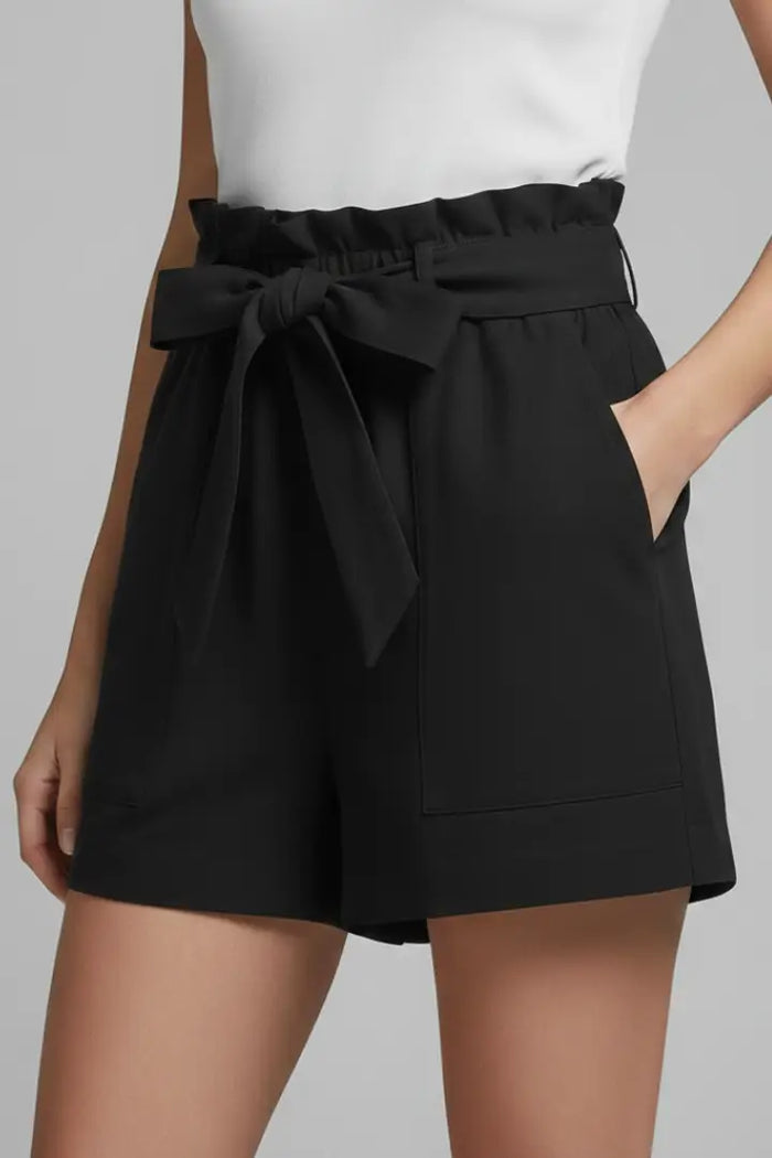 Women's breathable cotton summer shorts with high-waist and tie-waist design, styled for a relaxed summer look.