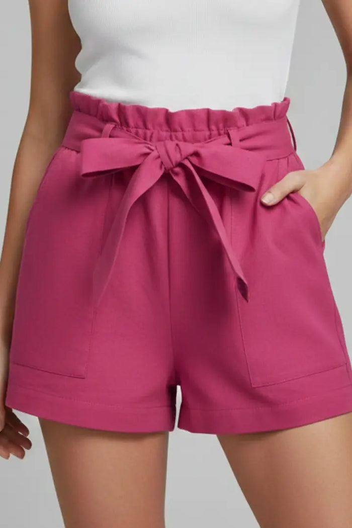 Women's breathable cotton summer shorts with high-waist and tie-waist design, styled for relaxed summer wear.
