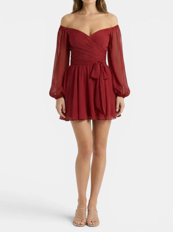 Women's breathable fabric mini dress with elegant wrap design and pleated skirt, perfect for summer wear.