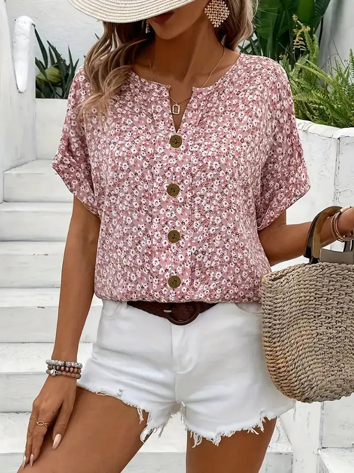 Women’s floral print breathable blouse by LondonLaneStore, lightweight flowing summer top with a vibrant floral pattern.