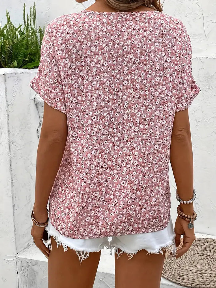 Women’s floral print blouse by LondonLaneStore, lightweight and breathable summer top with flowing fabric and vibrant floral design.