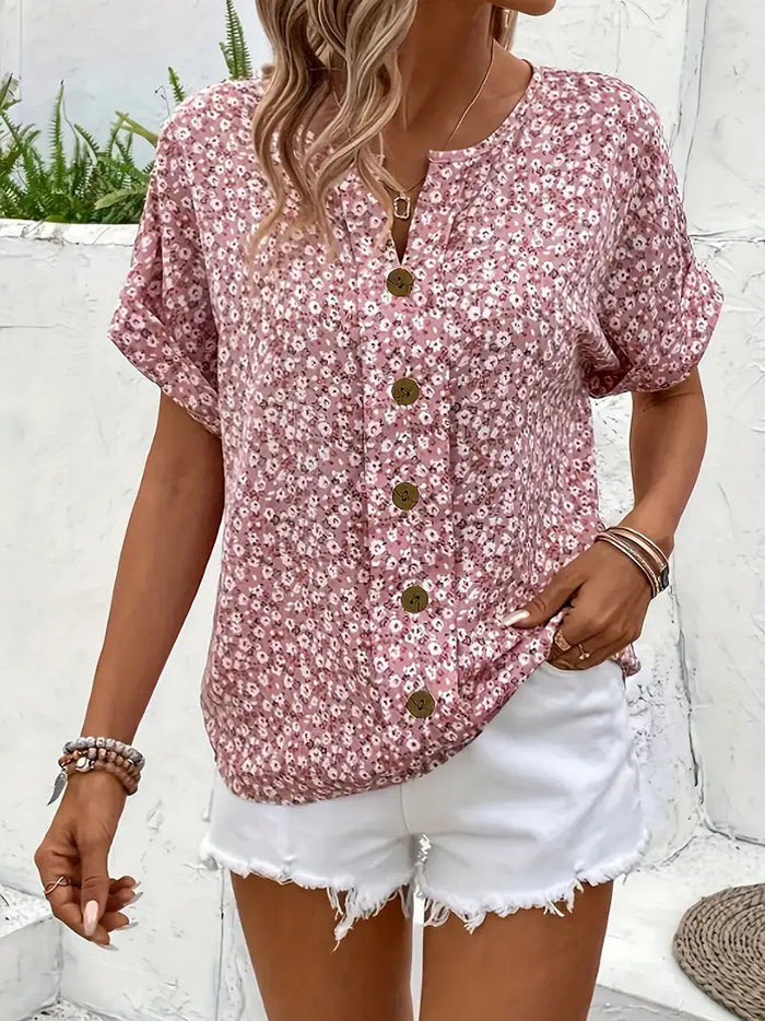Women’s breathable floral print blouse by LondonLaneStore, lightweight flowing summer top with vibrant floral design.